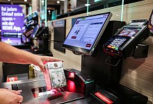 Selbstbedienungskasse - Oliver Berg/dpa