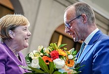 Angela Merkel und Friedrich Merz - Kay Nietfeld/dpa Angela Merkel und Friedrich Merz - Kay Nietfeld/dpa
