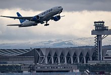 Passagiere fliegen weiterhin in die USA. - Jana Glose/dpa Passagiere fliegen weiterhin in die USA. - Jana Glose/dpa