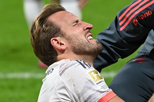 Stürmer-Star Harry Kane gab schnell Entwarnung - und sorgte für einen Bundesliga-Rekord. - © Arne Dedert/dpa