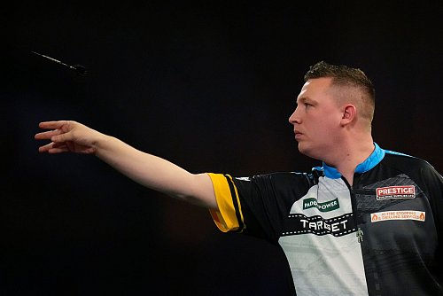 Für Chris Dobey ist die WM-Reise beendet. - © Kirsty Wigglesworth/AP/dpa