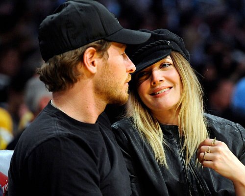 Drew Barrymore und ihr damaliger Ehemann Will Kopelman im Jahr 2011 in Los Angeles. - © picture alliance / dpa