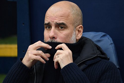 Wortkarg: Pep Guardiola will die Wechselspekulationen um Frankfurts Omar Marmoush nicht kommentieren. - © Rui Vieira/AP/dpa