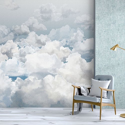 Die fließenden Farben der Aquarell-Tapete bringen Leichtigkeit und Kreativität in den Raum – ideal kombiniert mit natürlichen Materialien wie Holz. - © Hohenberger/DTI/dpa-tmn