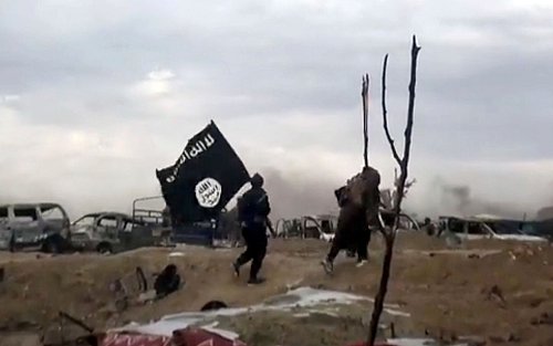 Ein 14-Jähriger soll in Köln Propaganda für die Terrorgruppe Islamischer Staat veröffentlicht haben. (Illustration) - © Amaq News Agency/AP/dpa