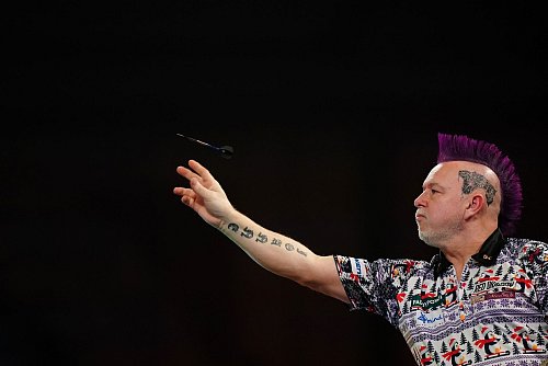Peter Wright schaffte gegen Weltmeister Humphries eine Überraschung. - © Zac Goodwin/PA Wire/dpa
