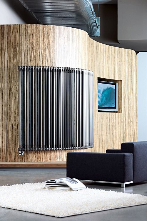 Für die Designer-Wohnung: Heizkörper gibt es auch in geschwungenen Formen. - © Thomas Bach/Zehnder Group Deutschland GmbH, Lahr/BDH/dpa-tmn