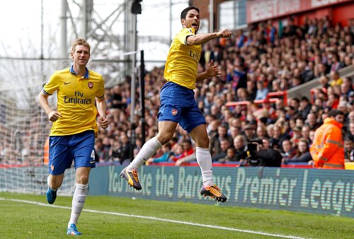 Früher schon Teamkollegen beim FC Arsenal: Per Mertesacker und Mikel Arteta (r). - © picture alliance / dpa
