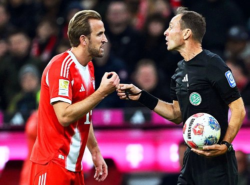 Harry Kane (l) war im Duell gegen den BVB überall im Einsatz. - © Sven Hoppe/dpa