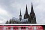 Regionalbahn fährt vor dem Kölner Dom in den Hauptbahnhof ein - Rolf Vennenbernd/dpa/dpa-tmn