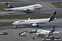 Jets von Boeing und Airbus am Flughafen Frankfurt am Main - Arne Dedert/dpa