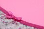 Ribbon on white women underwear with lace on pink background with copy space. Beauty fashion blogger - 1 - IMAGO/Panthermedia